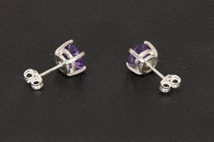 Amethyst Earrings set in a sterling silver double basket prong set back view