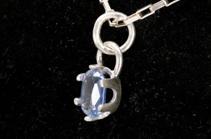 Natural Faceted Oval-Cut Royal Blue Kyanite Pendant set in Sterling Silver. 2.1 ct. stone. Right side view picture.