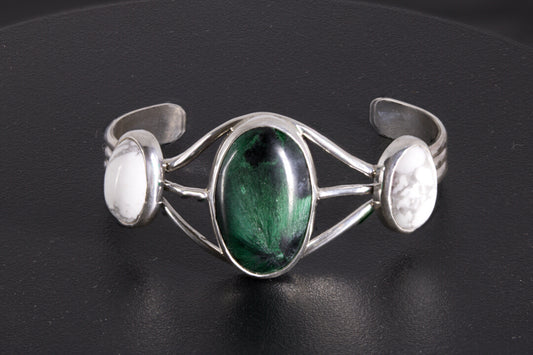 Fibrous Malachite and Howlite Sterling Silver Bracelet on a black background