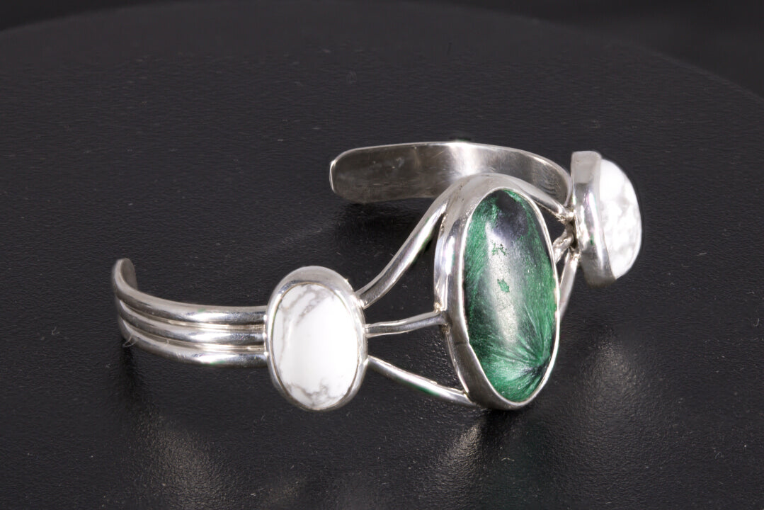 Fibrous Malachite and Howlite Sterling Silver Bracelet on a black background
