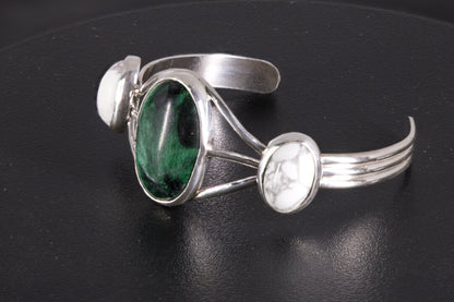 Fibrous Malachite and Howlite Sterling Silver Bracelet on a black background