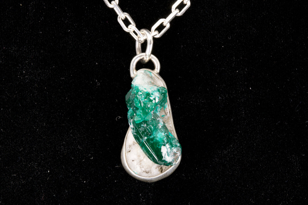 Green Apatite crystal Pendant stuck in its natural white rock matrix set in a sterling silver