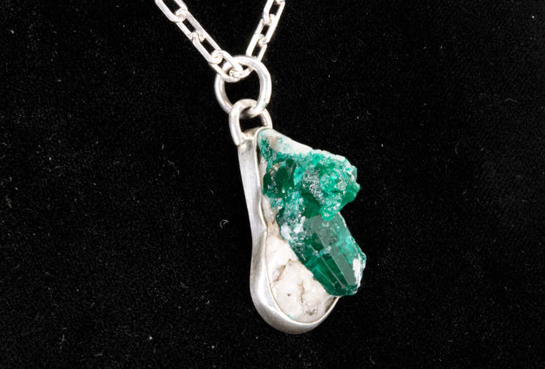 Green Apatite crystal Pendant stuck in its natural white rock matrix set in a sterling silver