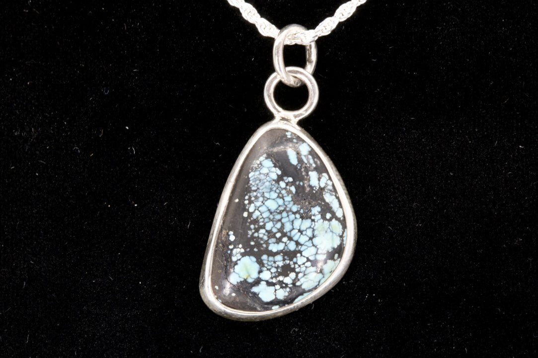 Blue Spiderweb Hubei Turquoise pendant Set In Sterling Silver