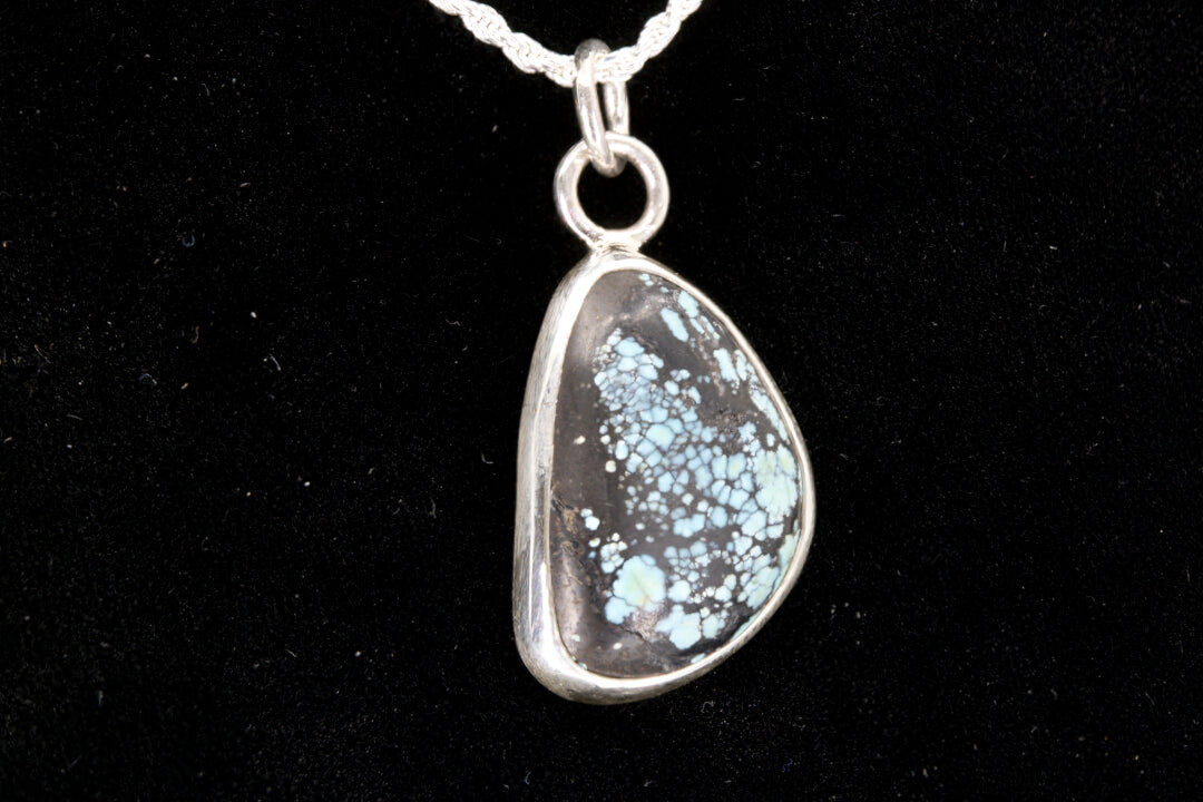 Blue Spiderweb Hubei Turquoise pendant Set In Sterling Silver