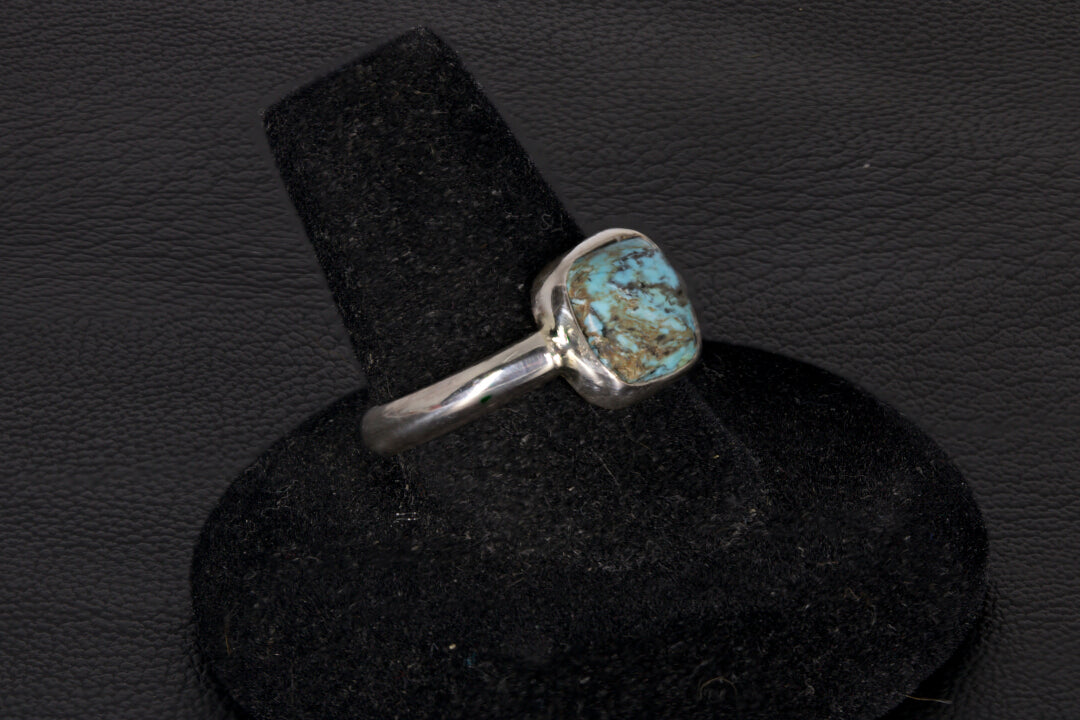 Square shaped Hubei Turquoise ring set in sterling silver with open back