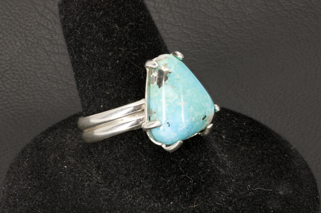 Arizona Turquoise with Pyrite and Quartz set in a double half round sterling silver ring band left photo.