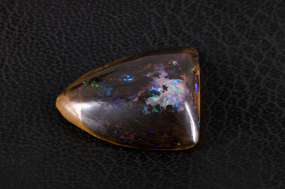 Koroit Boulder Opal Shield Cabochon with bright rainbow flash left side picture