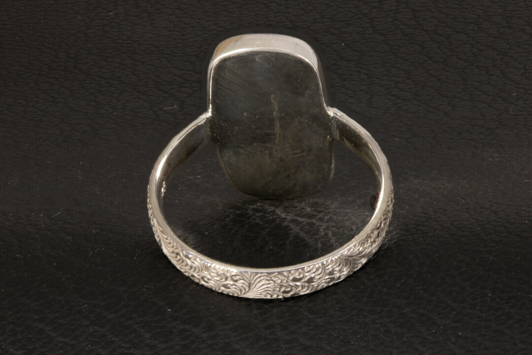 Chatoyant Larimar ring with decorative ring band back view