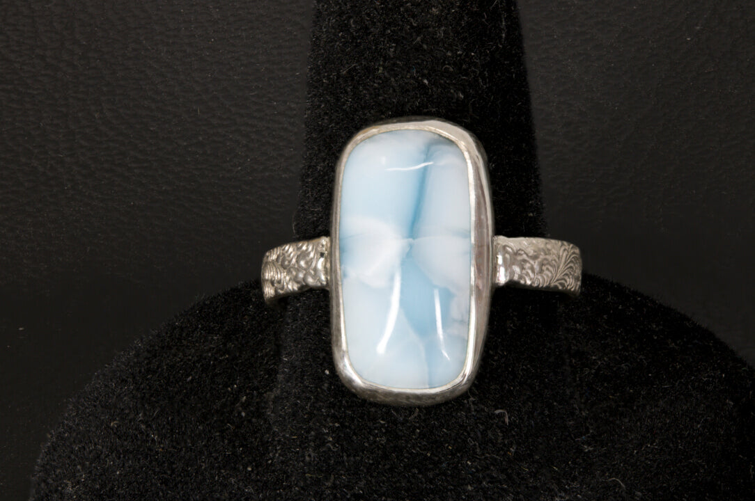 Chatoyant Larimar ring with decorative ring band front view