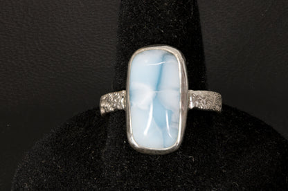 Chatoyant Larimar ring with decorative ring band front view