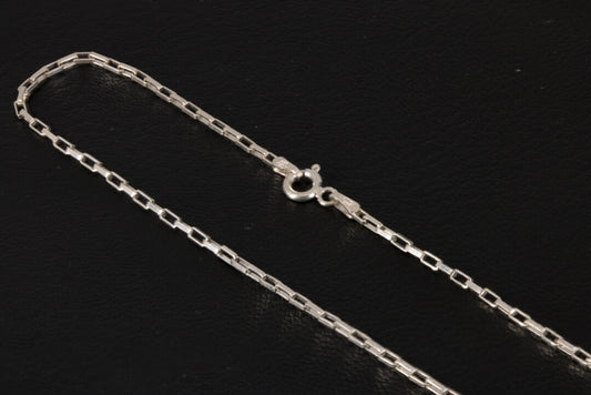 Long box chain 24 inch sterling silver on a black background