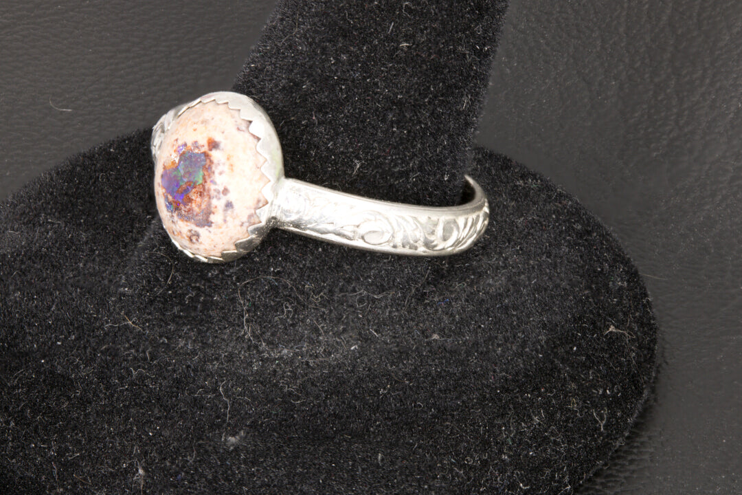 Mexican Cantera Opal set in a decorative sterling silver ring band right photo