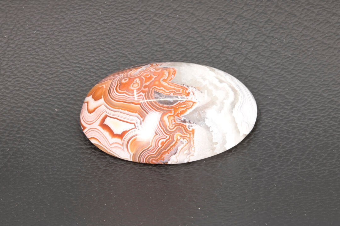 Red and White Crazy Lace Agate Cabochon left side picture