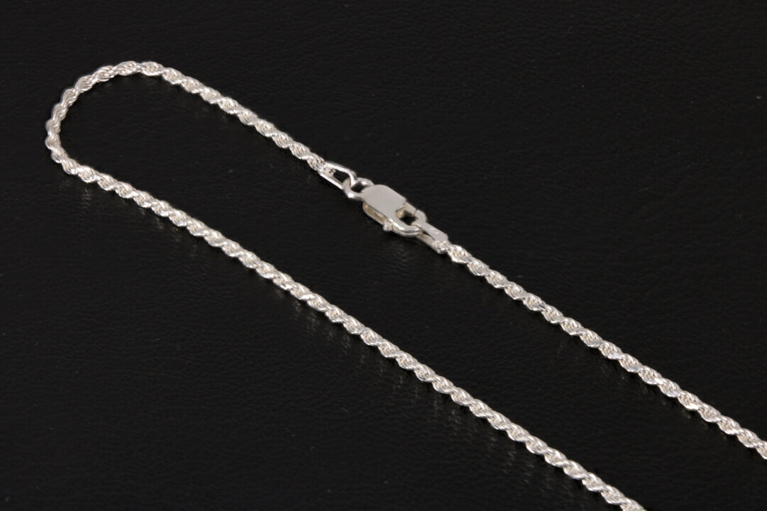 Sterling silver rope chain 20 inch on a black background