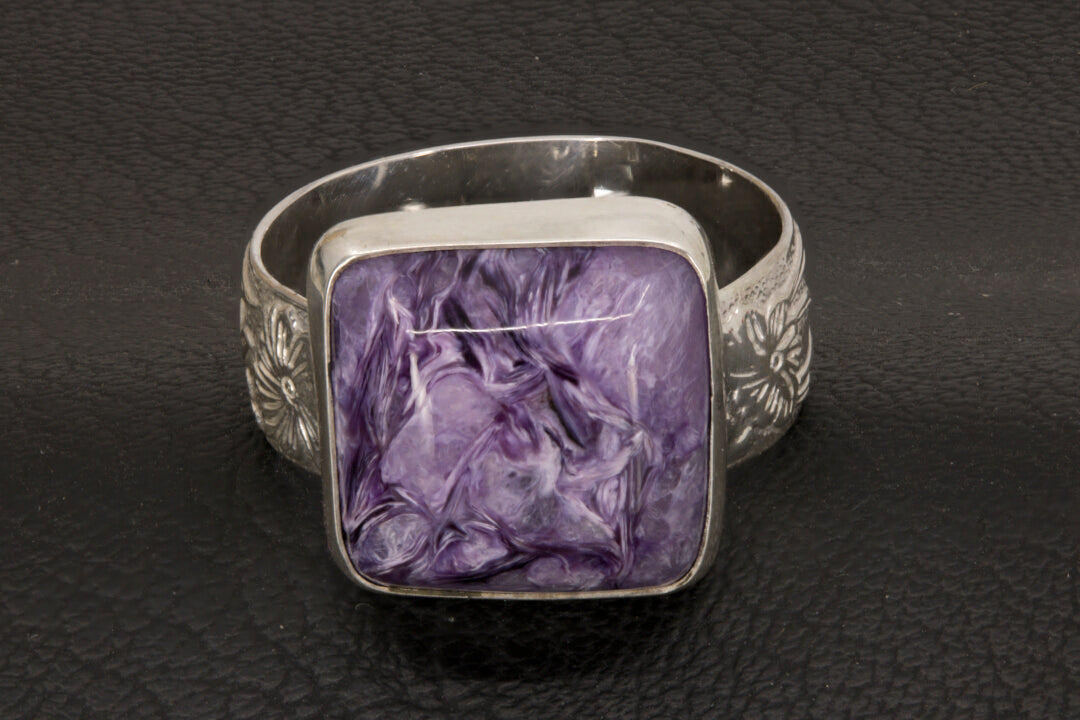 Square charoite ring with wide flower ring band size 10 front view