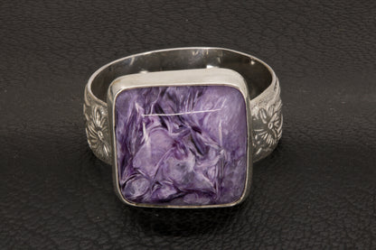 Square charoite ring with wide flower ring band size 10 front view