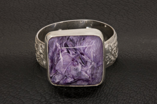 Square charoite ring with wide flower ring band size 10 front view