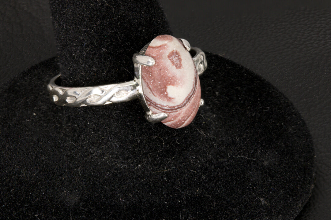 Wonderstone set in a sterling silver infinity ring band left photo