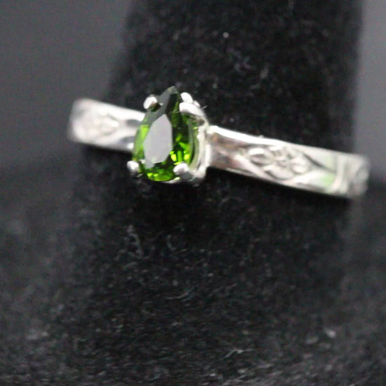 Tsavorite Garnet set in a sterling silver flower ring band video