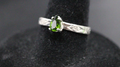 Tsavorite Garnet set in a sterling silver flower ring band video