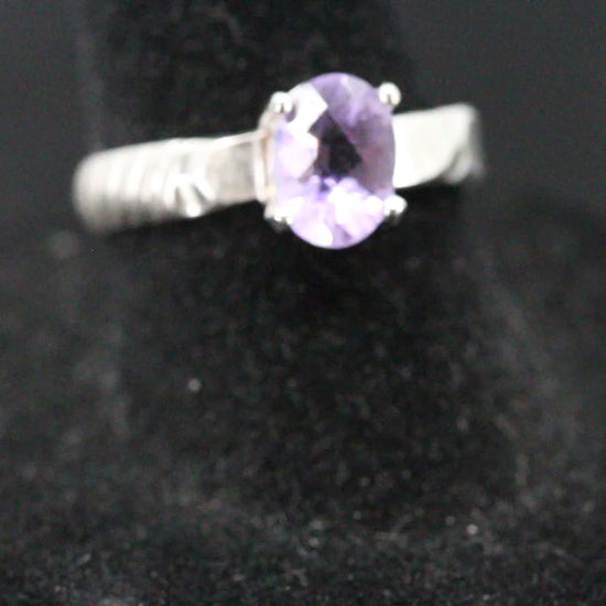 Beautiful oval cut Amethyst ring set in sterling silver with banded ring band, size 7 video 2