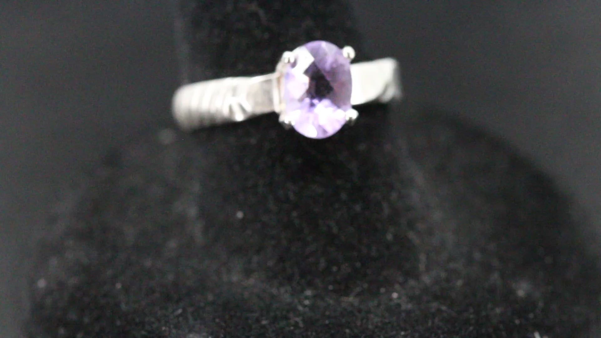 Beautiful oval cut Amethyst ring set in sterling silver with banded ring band, size 7 video 2