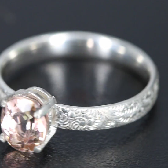 Peach Tourmaline oval facet set in a decorative sterling silver ring band video