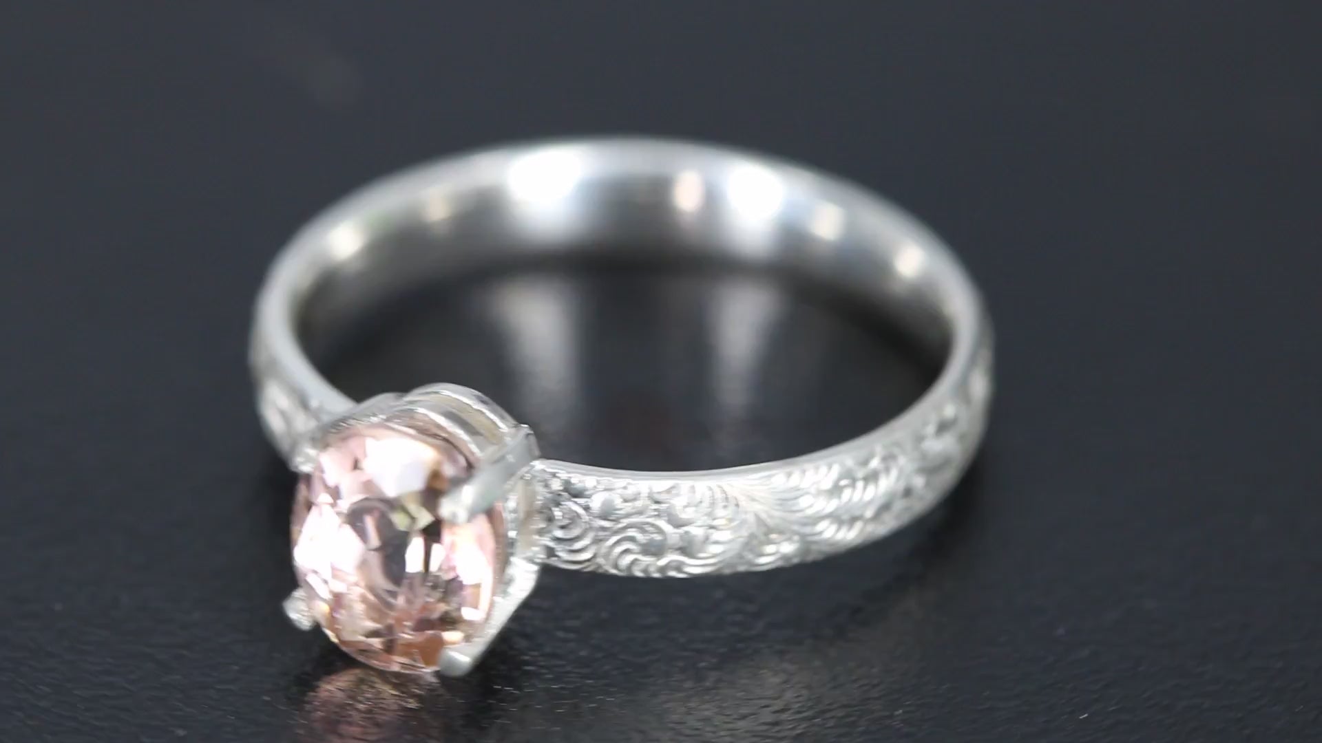 Peach Tourmaline oval facet set in a decorative sterling silver ring band video