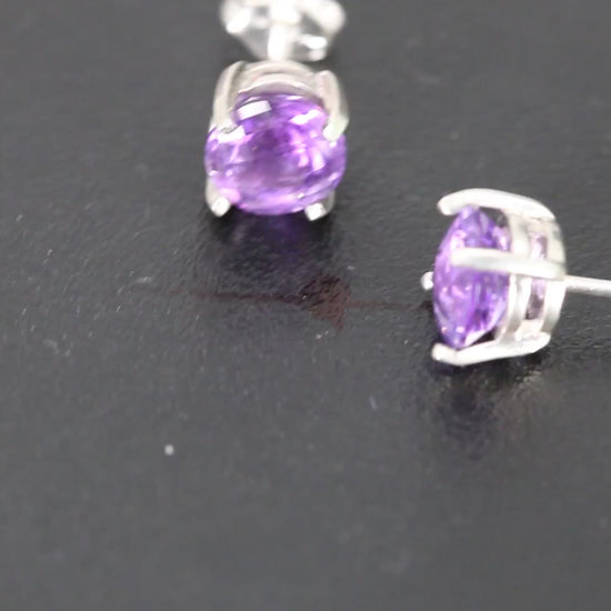 Amethyst Earrings set in a sterling silver double basket prong set video