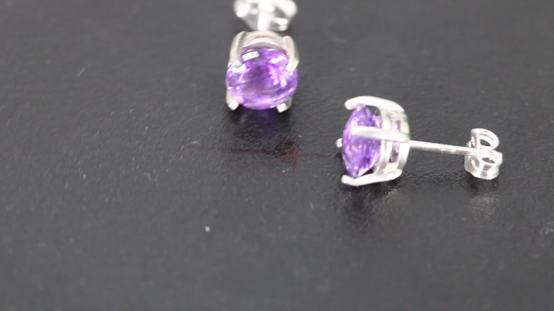 Amethyst Earrings set in a sterling silver double basket prong set video