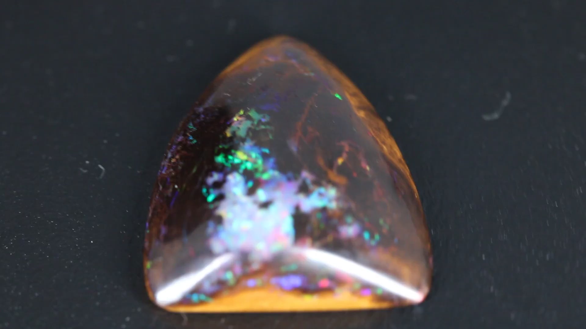 Koroit Boulder Opal Shield Cabochon with bright rainbow flash video