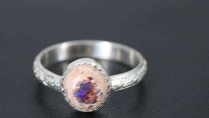 Mexican Cantera Opal set in a decorative sterling silver ring band